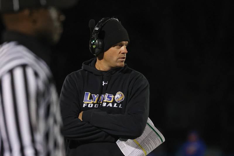 Lyons Township head coach Jon Buetjer walks the sidelines against Joliet West in the first round of the playoffs on Friday, Nov. 1, 2024 in La Grange.