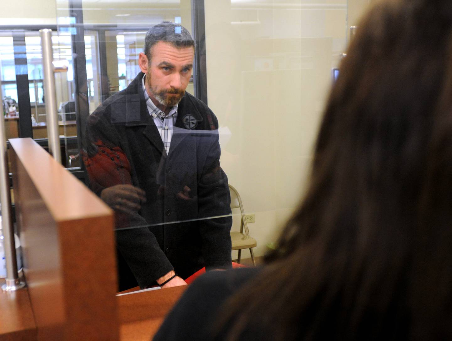 McHenry County sheriff candidate Robb Tadelman files his candidacy forms the morning of Monday, March, 7, 2022, at the McHenry County Clerk's Office in Woodstock. Monday was the first day for candidates to file ahead of the June primaries. This election season includes all McHenry County Board seats, the clerk, sheriff and regional superintendent of education. The candidates were trying to get the first slot on the ballot by filling at 8 a.m. When more than one candidate applies at a time, a lottery is held.