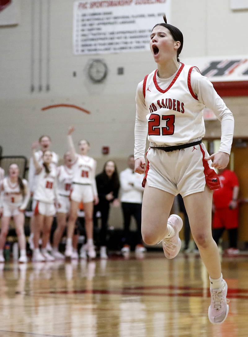Huntley's Aubrina Adamik celebrates a three point basket during the IHSA Class 4A Huntley Sectional Championship girls basketball game on Thursday, Feb. 27, 2025, at Huntley High School.