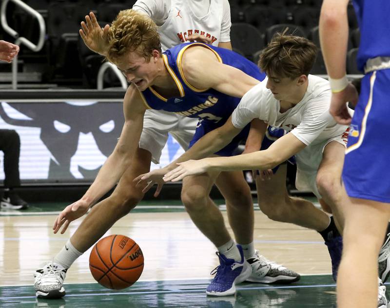 Johnsburg's Dylan Schmidt and McHenry's Carter Sites battle for a loose ball during a non-conference basketball game Sunday, Nov. 27, 2022, between Johnsburg and McHenry at Fiserv Forum in Milwaukee.