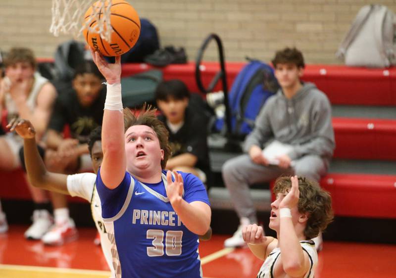 Princeton's Jordan Reinhardt runs in for a lyaup against Oak Forest during the Dean Riley Shootin' The Rock Thanksgiving Tournament on Tuesday, Nov. 26, 2024 in Kingman Gym at Ottawa High School.