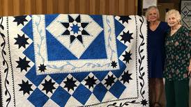 Sandwich church raffling quilt at Sandwich Fair