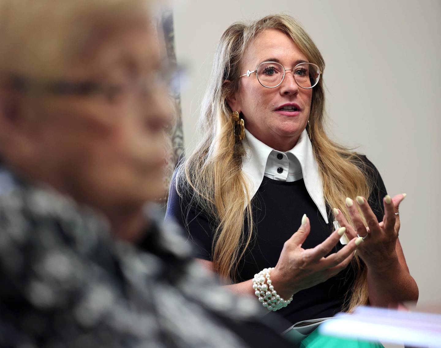 Rachel Lawson, executive director of Heritage Woods of DeKalb, talks Monday, July 14, 2025, at the assisted living facility, about what Medicaid means to residents who use it and how potential cuts could affect them.