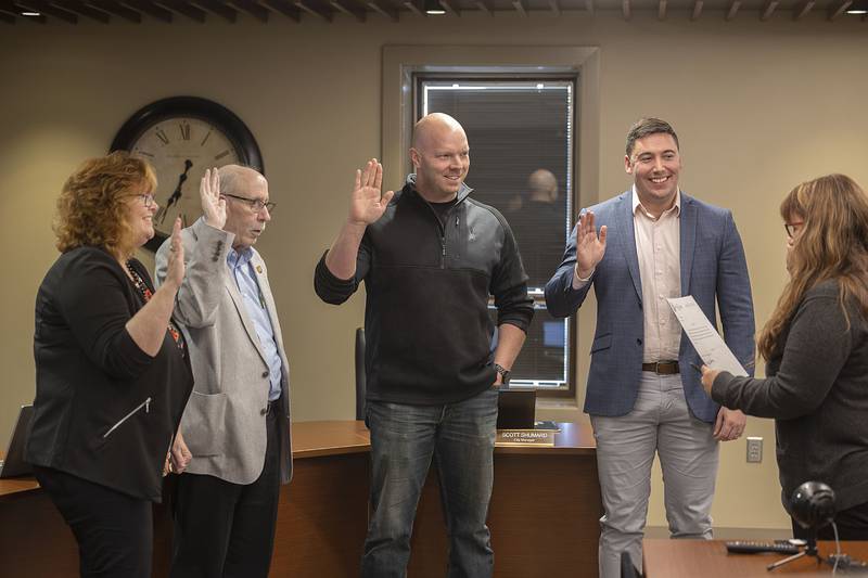 Alderman Retha Elston (left), Joe Martin, Josh Johnson and Joe Strabala-Bright are sworn in Monday, May 1, 2023 at Sterling’s City Council meeting.