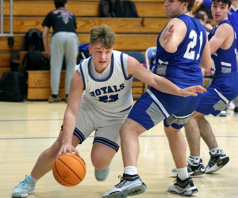 Hinckley-Big Rock's Luke Badal goes baseline against Rochelle Zell’s Sam Groth during their game Tuesday, Dec. 17, 2024, at Hinckley-Big Rock High School.