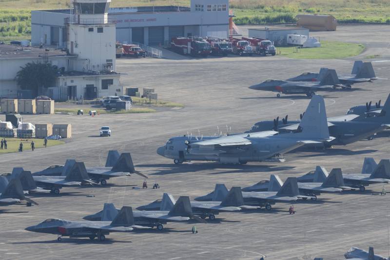 U.S. military aircraft are parked on the tarmac at Jose Aponte de la Torre Airport in Ceiba, Puerto Rico, Saturday, Jan. 3, 2025. (AP Photo/Alejandro Granadillo)