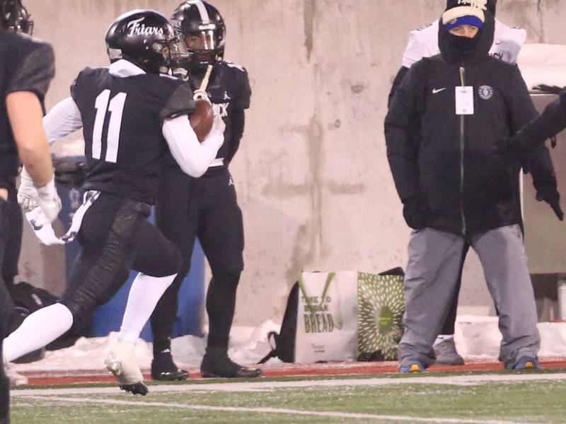 Fenwick's Odin Ferjak sprints down the field after intercepting a pass during the Class 6A State championship game on Tuesday, Dec. 2, 2025 in Hancock Stadium at Illinois State University in Normal.