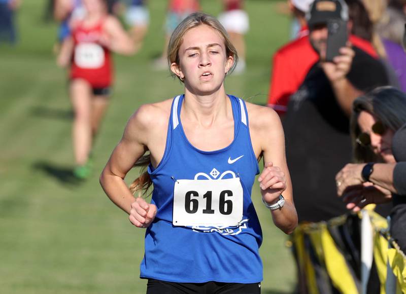 Hinckley-Big Rock’s Zeta Fay finishes the girls varsity race Tuesday, Sept. 2, 2025, during the Sycamore Cross Country Invitational at Northern Illinois University in DeKalb.