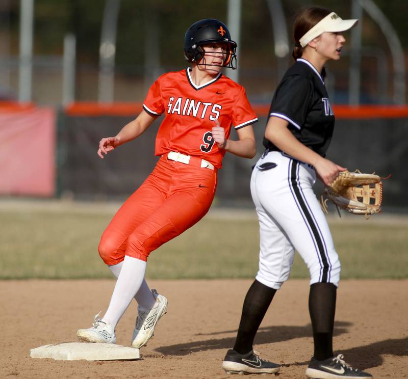 St. Charles East's Ari Bigda runs to second base during a game against Downers Grove North on Friday, March 28, 2025 in St. Charles.