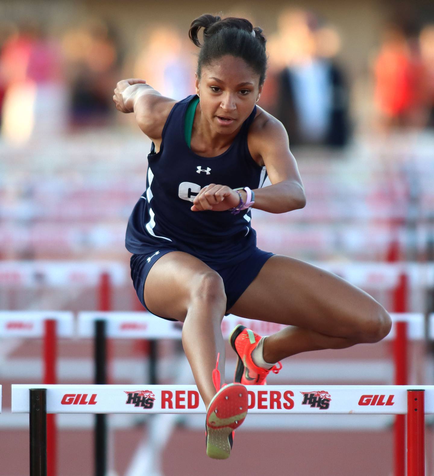 Cary-Grove’s Olivia Parker clears the final hurdle en route to a win in the 100-meter hurdles in IHSA Class 3A Girls Sectional Track and Field Meet action at Red Raider Stadium on the campus of Huntley High School in Huntley on Wednesday, May 14, 2025.