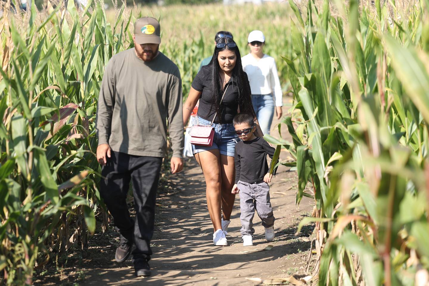The Esparza family makes their way out of the corn maze at Konow’s Corn Maze on Saturday, Sept. 30, 2023 in Homer Glen.