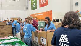 Photos: Aldi packs 6,000 boxes of food at Northern Illinois Food Bank in Geneva