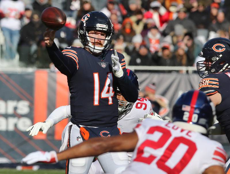 Chicago Bears quarterback Andy Dalton delivers a pass ahead of the New York Giants pass rush during their game Sunday, Jan. 2, 2021, at Soldier Field in Chicago.