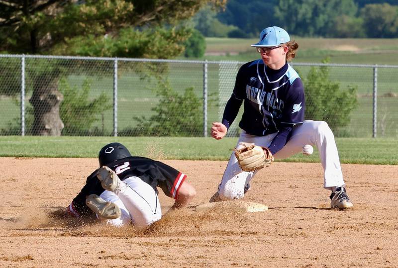 Bureau Valley's Drake Taylor takes the throw to second base in Thursday's regional semifinal game at Manlius. Orion won 6-0.