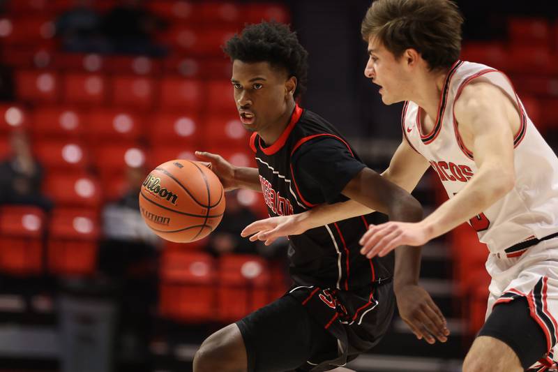 Bolingbrook’s Mekhi Cooper looks to make a play against Barrington in the Class 4A 3rd place match at State Farm Center in Champaign. Friday, Mar. 11, 2022, in Champaign.
