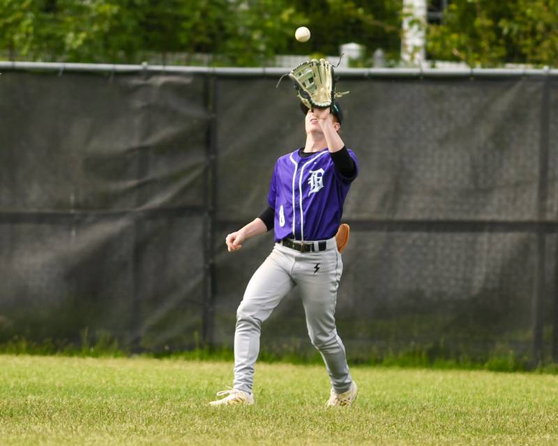 Downers Grove North's Drake Cosenza (8) catches the ball during the game on Monday May 19, 2025, while taking on York High School in Elmhurst.