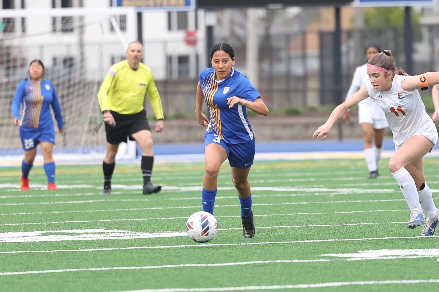 Joliet Central’s Kathleen Hernandez works the ball upfield against Plainfield East on Thursday, April 11, 2024.