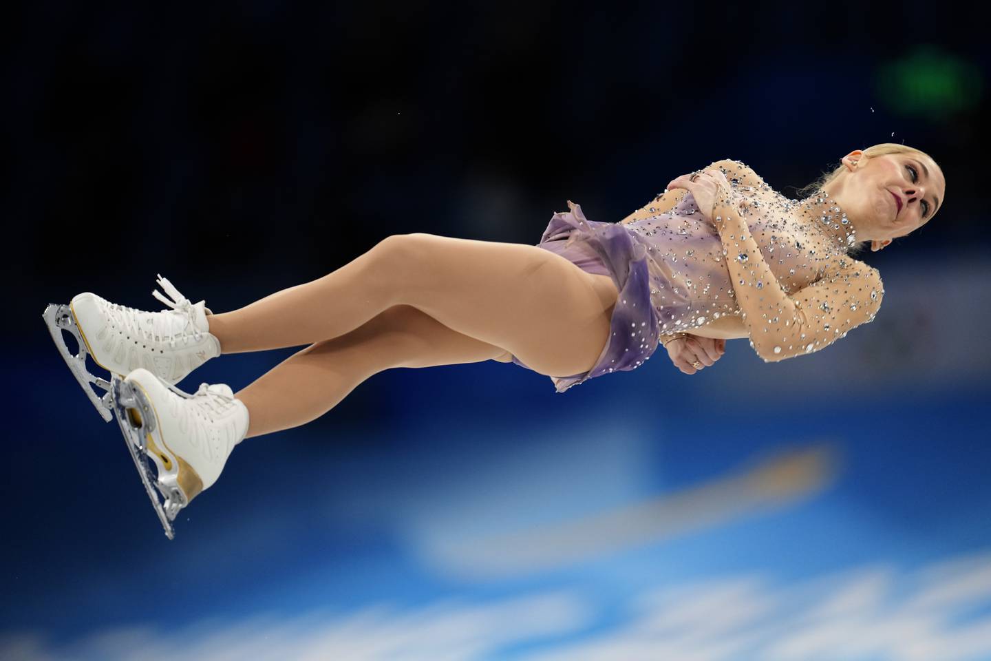 Alexa Knierim competes in the pairs team free skate program during the 2022 Winter Olympics in Beijing.