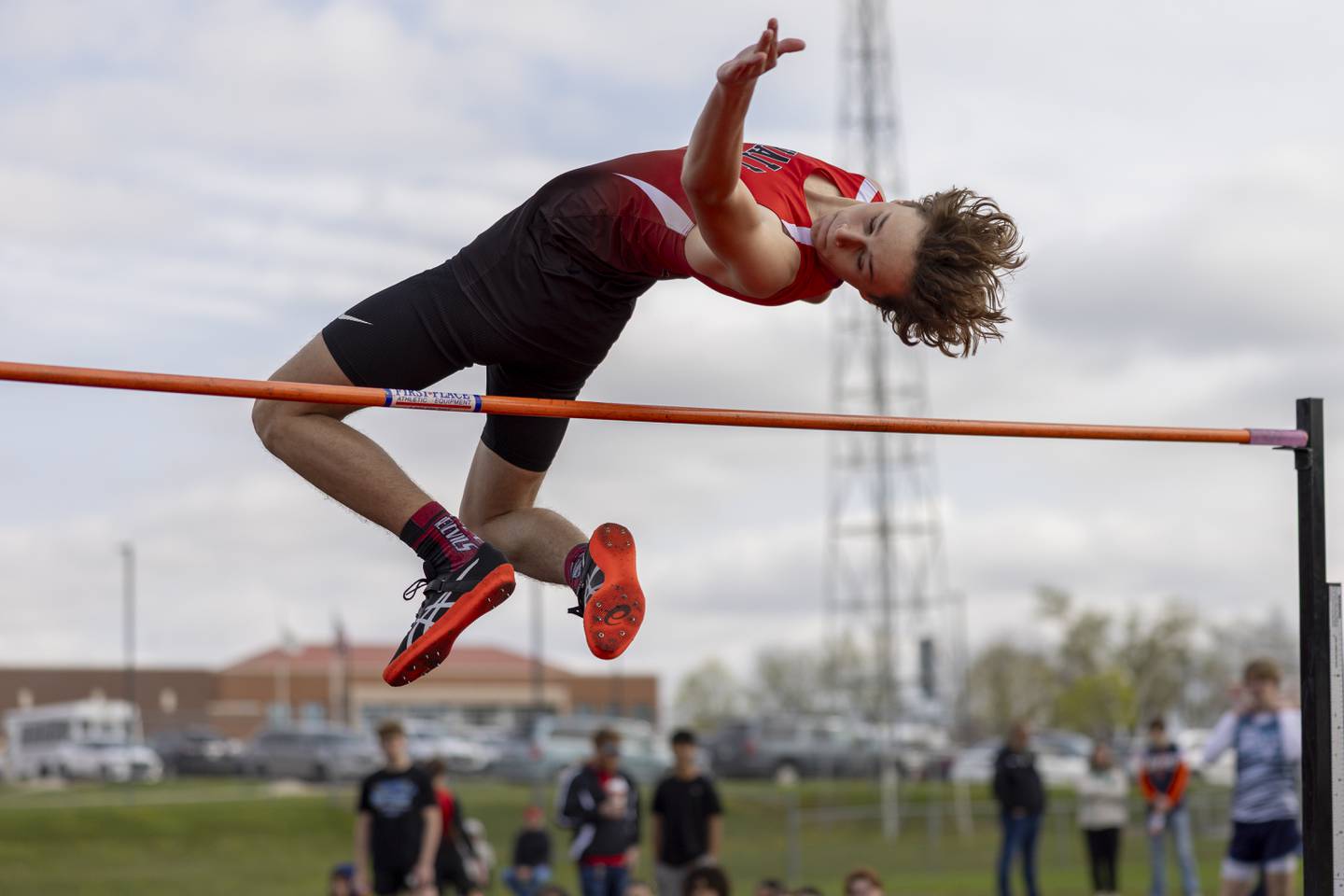 Joseph Perez of Hall High School leaps over the bar during the boys high jump event at the Rollie Morris Invite on April 19, 2025 at St. Bede Academy.