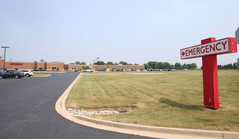 An Emergency sign points to the emergency room at Saint Paul Medical Center on Tuesday, June 13, 2023 in Mendota. The Emergency room is located behind the building on the south side.