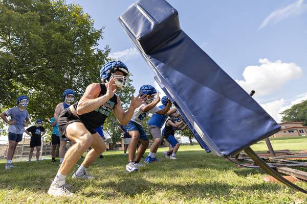 Photos: Newman football takes the practice field