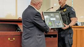 Longtime Oswego police commissioner honored for his efforts