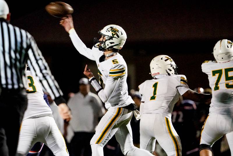 Waubonsie Valley's Josh (5) throws a screen pass against Oswego during a Class 8A first-round playoff game at Oswego High School on Friday, Nov. 1, 2024.
