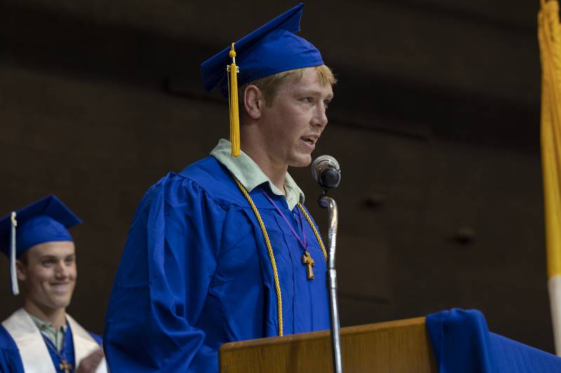 Student speaker Daniel Kelly takes the podium Wednesday, May 21, 2025, during Newman High School’s 2025 commencement.