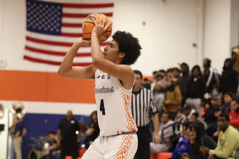 Romeoville's Seth Covington puts up a three-point shot against Bolingbrook on Tuesday, Dec. 2, 2025 in Romeoville.