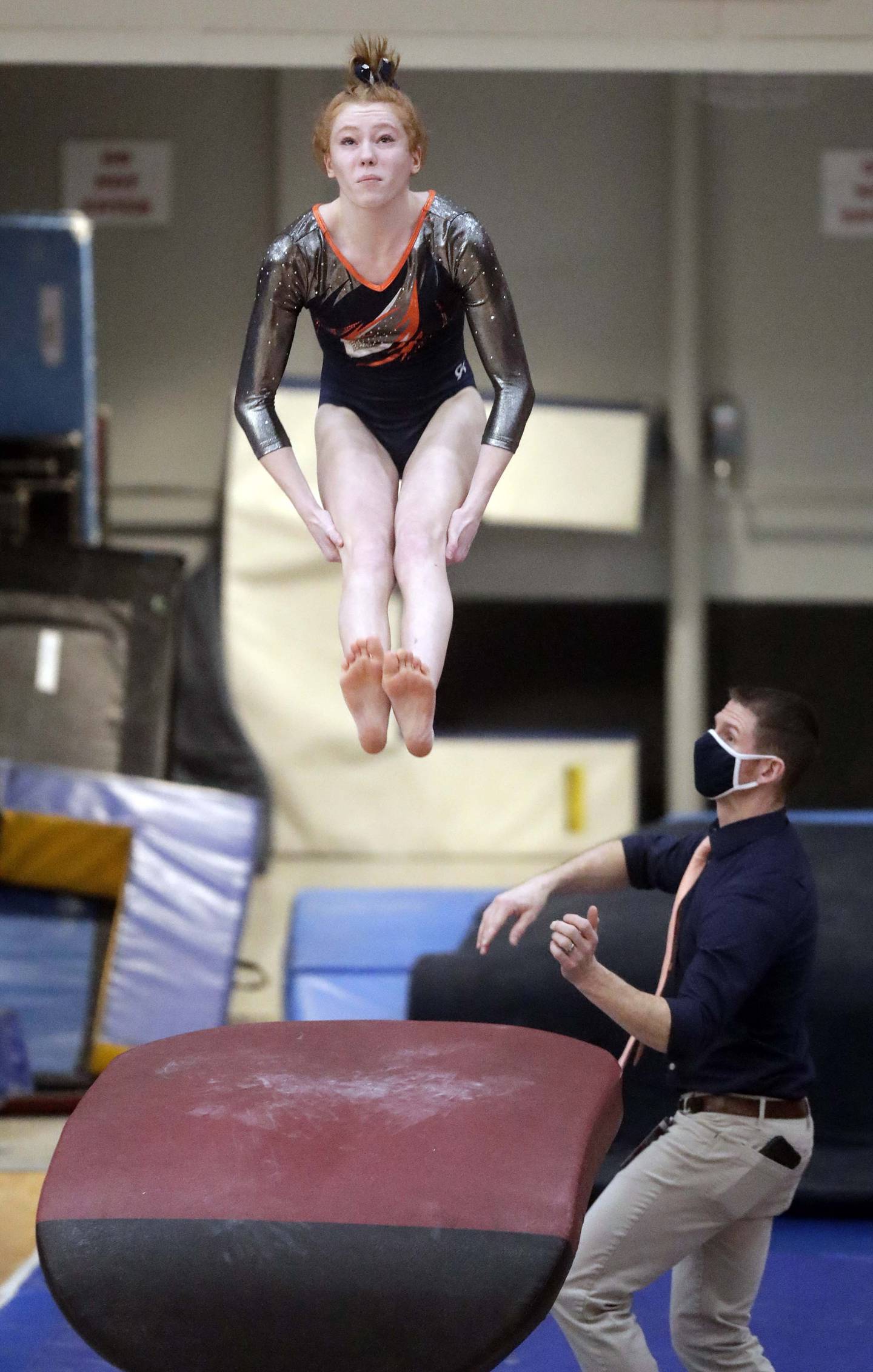 Oswego’s Sam Phillip competes on the vault during the IHSA Girls Gymnastics State Finals Saturday February 19, 2022 at Palatine High School.