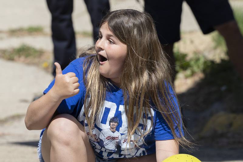 Lincoln fifth grader Bryleigh Wyatt checks on her egg Friday, May 16, 2025, after the successful landing.