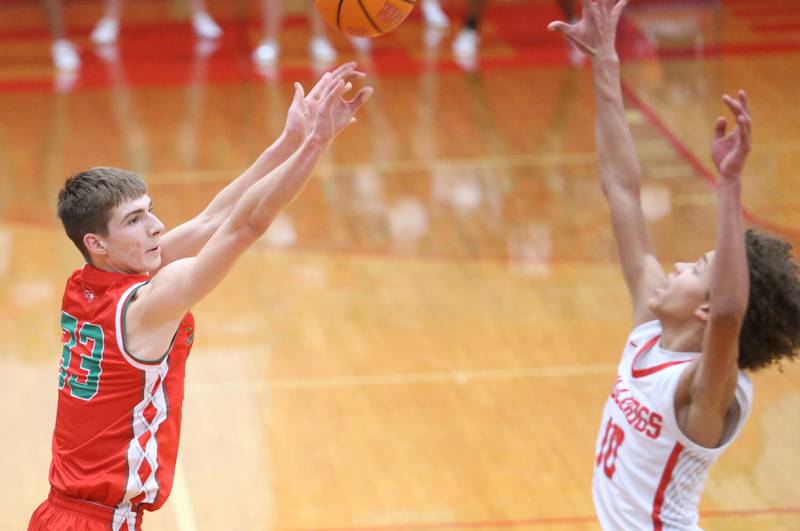 L-P's Gavin Stokes lets go of a shot over Streator's Christian Bruton on Tuesday, Jan. 13, 2026 in Pops Dale Gymnasium at Streator High School.