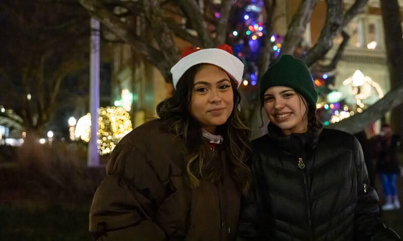 Daisy Zarzua (left) Grace Deanna (right) during Christmas festivities in La Grange on Saturday, Dec. 3, 2022.