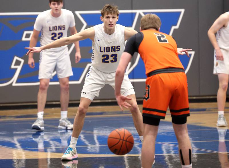 Lyons Township's Tyler Kuta guards DeKalb’s Sean Reynolds Monday, Jan. 15, 2023, during their game in the Burlington Central Martin Luther King Jr. boys basketball tournament.