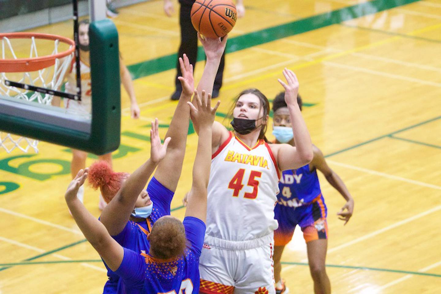 Batavia's Tessa Towers puts the shot up against Butler Prep