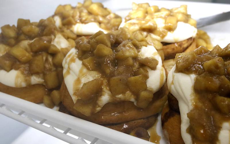 Carmal apple cinnamon rolls for sale on Friday, June 27, 2025, at the recently opened Black Market Bakery in downtown Crystal Lake.