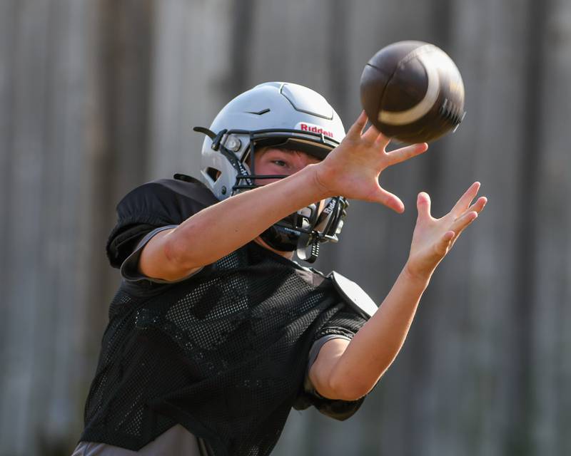 Brady Brown of Kaneland tries to catch the ball during a joint practice with Oswego on Thursday July 10, 2025, held at Oswego High School.