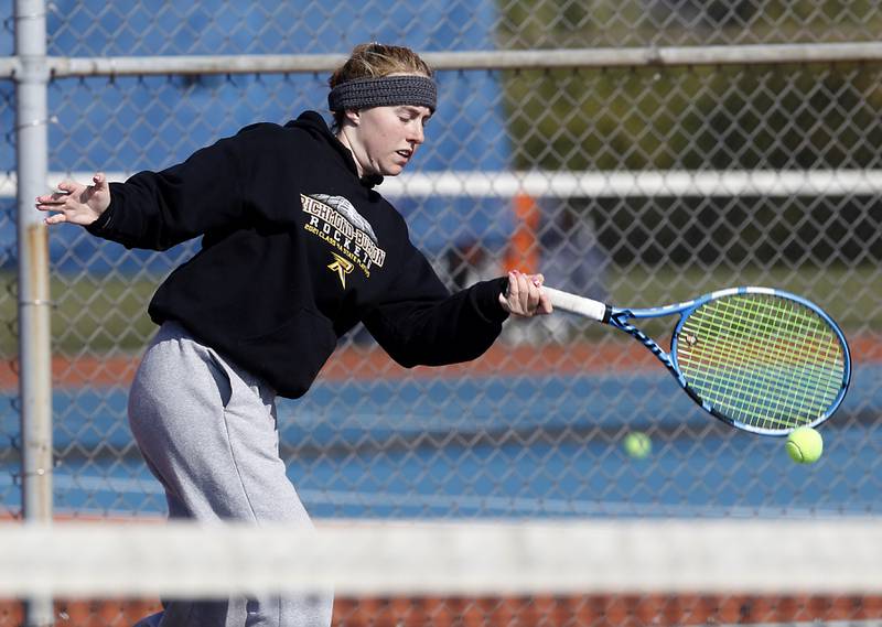 Richmond-Burton’s Savannah Webb returns the ball Thursday, Oct. 20, 2022, during during the first day of the IHSA State Girls Tennis Tournament at Hoffman Estates High School in Hoffman Estates.