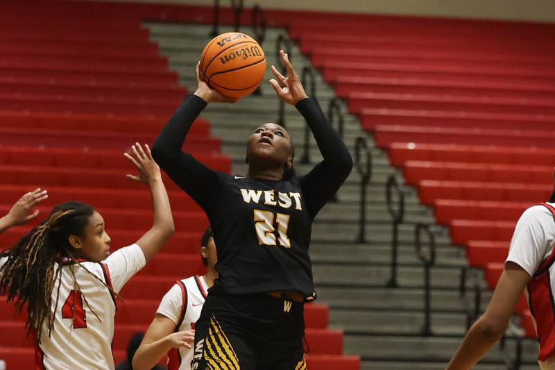 Joliet West’s Jada Thompson puts up a shot against Bolingbrook on Thursday, Jan 23, 2025 in Bolingbrook.