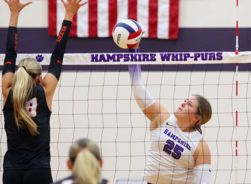 Hampshire’s Hailey Homola hits the ball against Libertyville in an IHSA volleyball Class 4A Sectional Championship at Hampshire High School in Hampshire on Thursday, November 6, 2025.