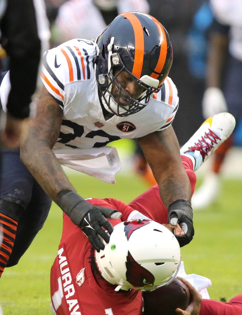 Chicago Bears defensive tackle Justin Jones sacks Arizona Cardinals quarterback Kyler Murray during their game Sunday, Dec. 24, 2023, at Soldier Field in Chicago.