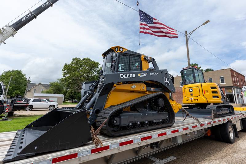 Bulldozers sit on trailer for the 21st annual Convoy Against Cancer on Saturday, July 19, 2025 on Main Avenue in Ladd.
