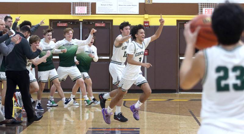 Grayslake Central’s Rams celebrate a 56-51 win over Crystal Lake South in Hinkle Holiday Classic Basketball Tournament title game action at Jacobs High School Friday.
