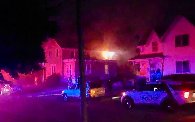 Firefighters and police on the scene of an apartment fire in the 600 block of South Cross Street in Sycamore on Thursday, July 3, 2025.