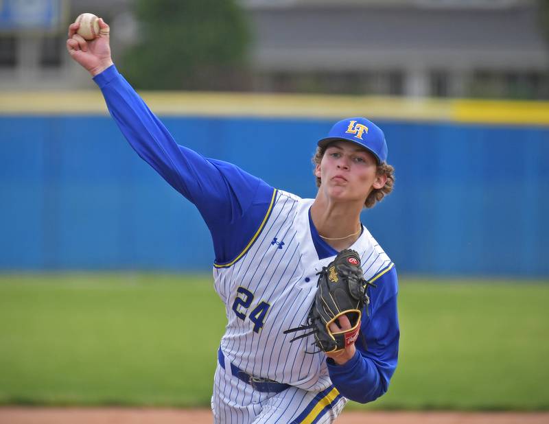 Lyons Township’s Tommy Cavaliere delivers to a Downers Grove North batter during a game on May 18, 2026 at Lyons Township High School in LaGrange.