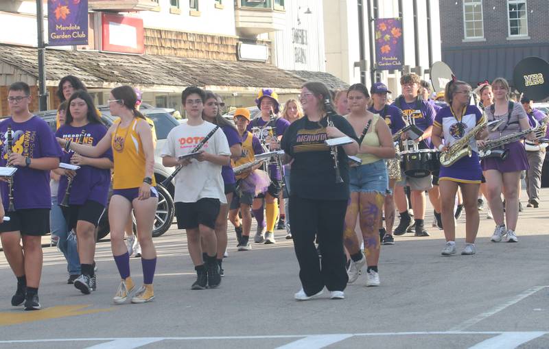 Members of the Mendota High School Band march down Indiana Avenue during the homecoming parade on Friday, Oct. 3, 2025