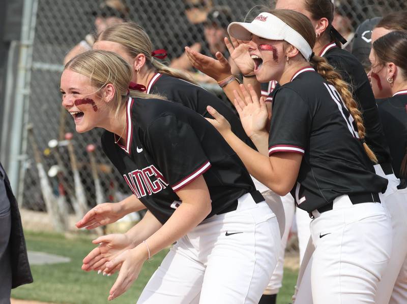 Antioch players wait at home to welcome teammate Samantha Hillner to the plate after she homered during their Class 3A supersectional win Monday, June 3, 2024, over Sycamore at Kaneland High School in Maple Park.