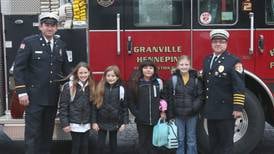 Photos: Putnam County students ride to school on a fire engine