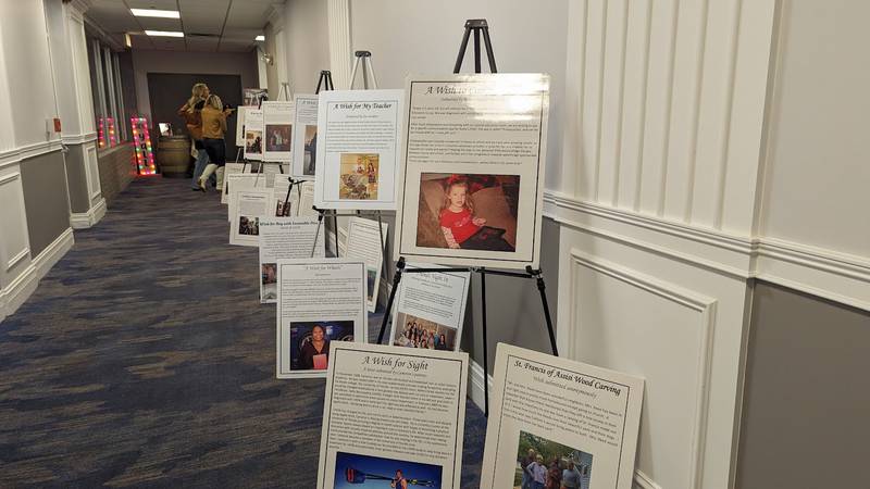 A display of "wishes" Shorewood HUGS fulfilled greets attendees at the entrance of the nonprofit’s annual chocolate ball fundraiser on Saturday, Feb. 3, 2024, at the  Posh Banquets & Event Center in Joliet. The annual fundraiser raises money for the nonprofit's "Hugs and Wishes" program.