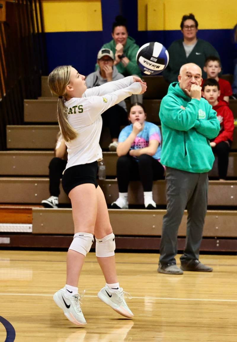 Josie Edgcomb makes a pass for Demi Salazar's Spring Valley JFK's Wildcats  Saturday's IESA Regional match at Princeton Logan.